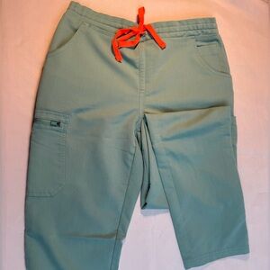 Figs Technical Collection Scrub Top, TW2000T, in Sage with coral draw string